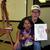 Eddie and a little girl he just drew.