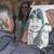 David crawing a couple's caricature.